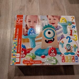 Hape Monster Weighing Scale Toy - Blue and Red